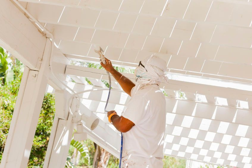 A client's house undergoing residential painting services at St. Petersburg, FL.